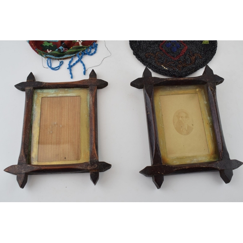 284 - A pair of 19th century wooden picture frames together with two beadwork frames. (4)