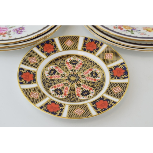 30 - Royal Crown Derby to include an Imari side plate, 16cm diameter, with a set of six RCD floral plates... 