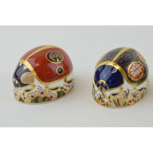 38 - Three Royal Crown Derby Paperweights, Red Ladybird with two spots, Red Ladybird with seven spots and... 