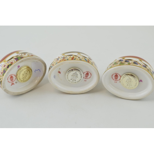 38 - Three Royal Crown Derby Paperweights, Red Ladybird with two spots, Red Ladybird with seven spots and... 