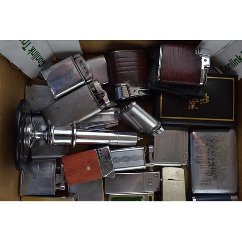 451 - A good and interesting collection of vintage lighters to include makes such as Ronson, Tommy Pipe, M... 