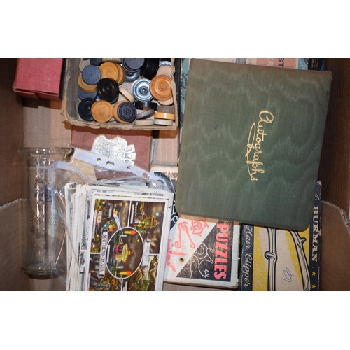 464 - A mixed collection of vintage games, ephemera, advertising tins, postcards and an autograph book. (Q... 