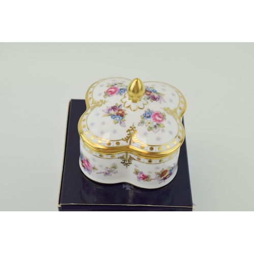 48 - A Royal Crown Derby Royal Antoinette dressing table lidded trinket box, red printed marks on the bas... 