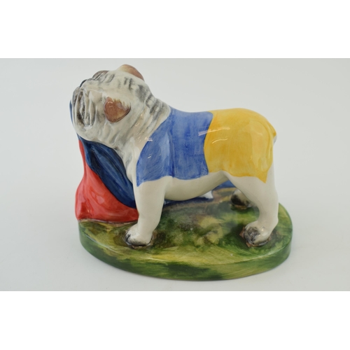 57 - Bairstow Manor Collectables topical political model of a Ukranian bulldog biting into a Russian flag... 