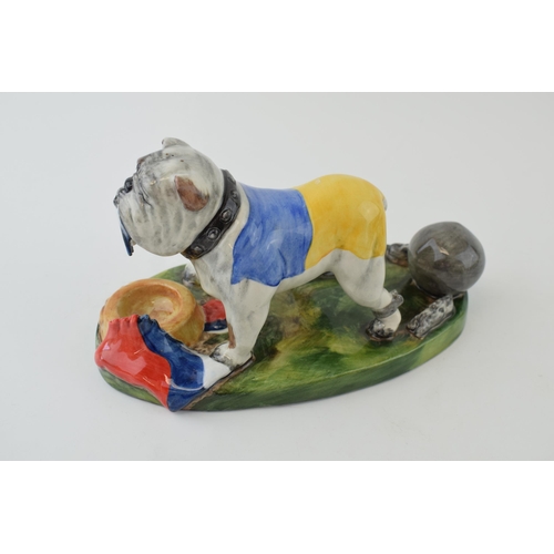 58 - Bairstow Manor Collectables political model of a Ukranian bulldog tearing a Russian flag apart, 20cm... 