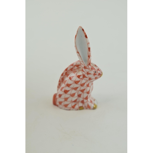 6 - Herend Pottery miniature figure of a lop-eared rabbit, in red fishnet decoration, 5.8cm tall.