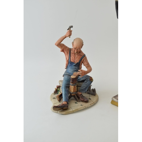 63 - A Capo Di Monte figure of a professor, 35cm tall, with a cobbler (2).