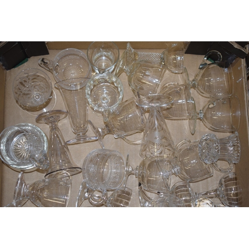 79 - A large collection of Victorian and later custard glasses with varying design, some plain, some etch... 