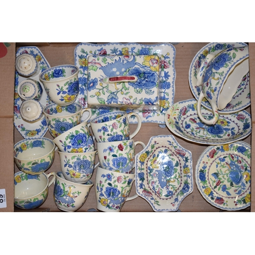 89 - Masons Pottery in the Regency pattern to include a butter dish, a lidded tureen, a cruet set, cups, ... 