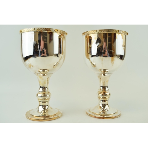 105 - A near pair of De Lamerie silver plated goblets, ornate edge with jewel-effect design, 23cm tall, co... 