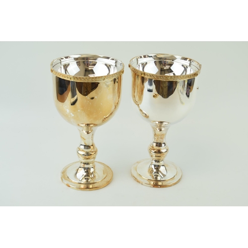 105 - A near pair of De Lamerie silver plated goblets, ornate edge with jewel-effect design, 23cm tall, co... 