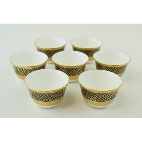 106 - De Lamerie Fine Bone China Set of seven Black Spiral & Twist pattern Arabic Tea Cups, diameter 7cm (... 