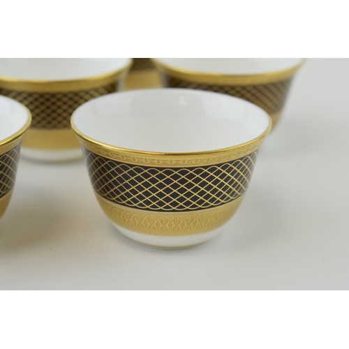 106 - De Lamerie Fine Bone China Set of seven Black Spiral & Twist pattern Arabic Tea Cups, diameter 7cm (... 