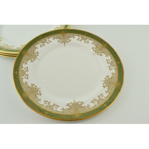 117 - De Lamerie Fine Bone China, Chatsworld Garland pattern in Gold and Green, to include 4 dinner plates... 