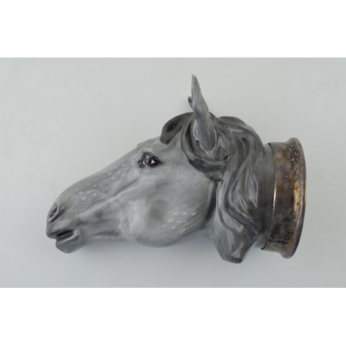 124 - Royale Stratford stirrup cup in the form of a horse's head, silver plated mount, 13cm tall.