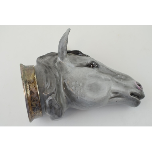 124 - Royale Stratford stirrup cup in the form of a horse's head, silver plated mount, 13cm tall.