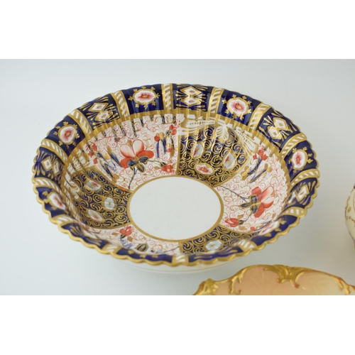 135 - A large shaped edge Imari pottery bowl, similar to Royal Crown Derby, with a Taylor Tunnicliffe & Co... 