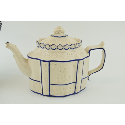 141 - Early 19th century Feldspathic teapot with sliding lid, traditional relief scenes (with damages), wi... 