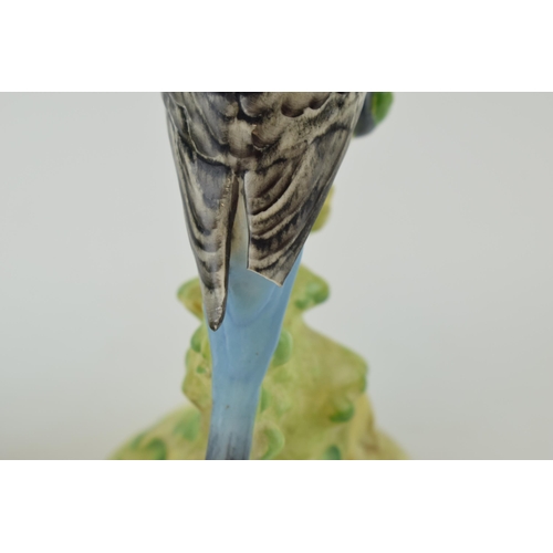 150 - A pair of Beswick Blue Budgerigars / Budgies, both 1217, both with damages (2).