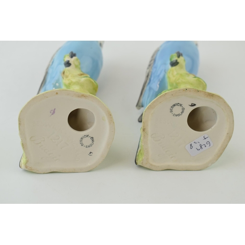 150 - A pair of Beswick Blue Budgerigars / Budgies, both 1217, both with damages (2).