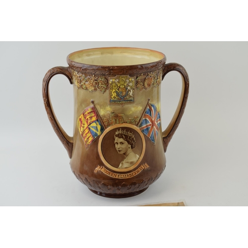 180 - Royal Doulton Queen Elizabeth II loving cup with twin handles, to commemorate the coronation of Quee... 