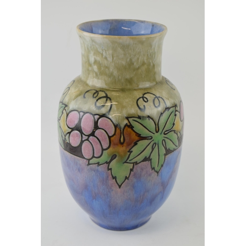 194 - Royal Doulton Lambeth stoneware vase with fruits and foliage design, mottled glaze, 27.5cm tall.