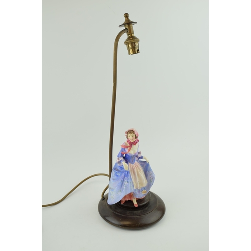 226 - Royal Doulton figural table lamp with pink shade, Suzette, HN1577, in floral blue colourway, with re... 