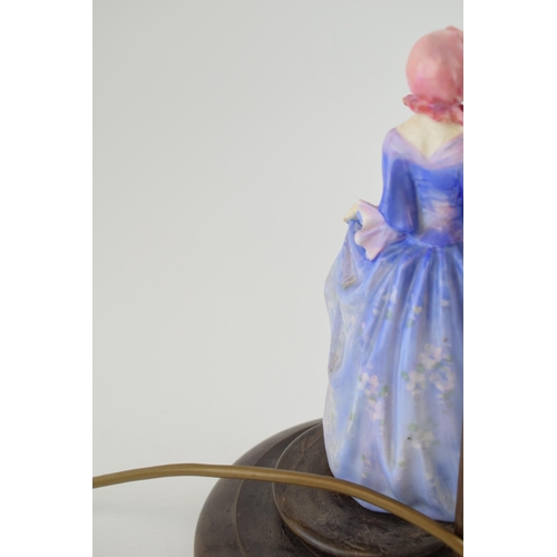 226 - Royal Doulton figural table lamp with pink shade, Suzette, HN1577, in floral blue colourway, with re... 