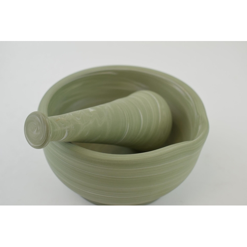 244 - Wedgwood Agate Jasperware mortar and pestle, 13cm diameter.