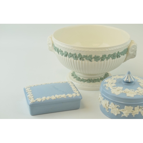 256 - A collection of Wedgwood Embossed Queensware items, to include jug, height 16cm. A lidded circular p... 