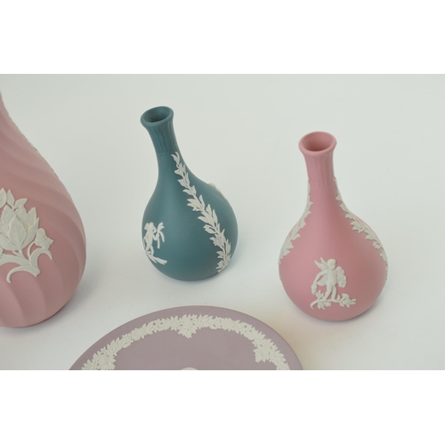 258 - A collection of Wedgwood Jasperware items to include pink vase, pin tray and bud vase, lilac 6 1/2