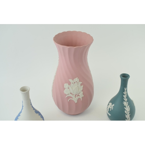 258 - A collection of Wedgwood Jasperware items to include pink vase, pin tray and bud vase, lilac 6 1/2