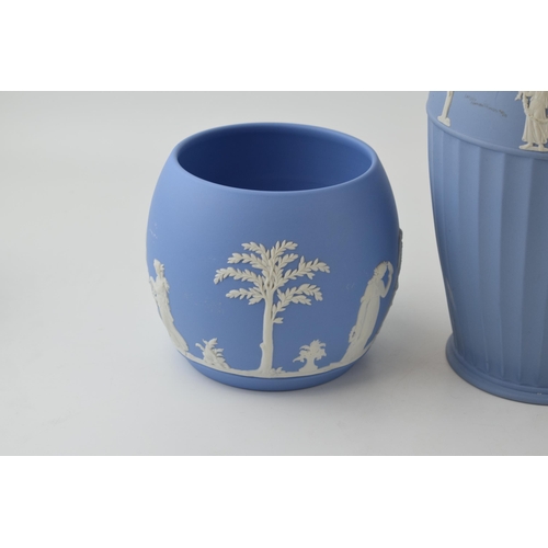 269 - Wedgwood Jasperware in blue to include a large ribbed vase, 25cm tall, with a near pair of bulbous v... 