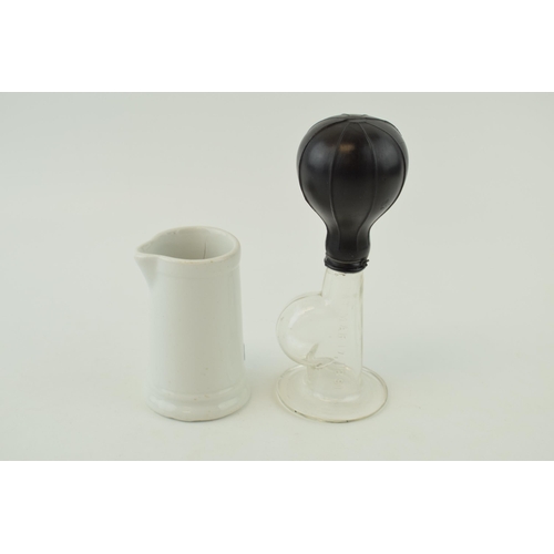 278 - An antique Boots Chemists 'Breast Pump' PAT. March 17, 1891, together with a Maddock and Sons milk j... 