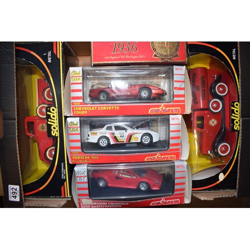 492 - A collection of boxed vintage die cast vehicles to include Solido 8003 and 8005 Fire Engines, Majore... 