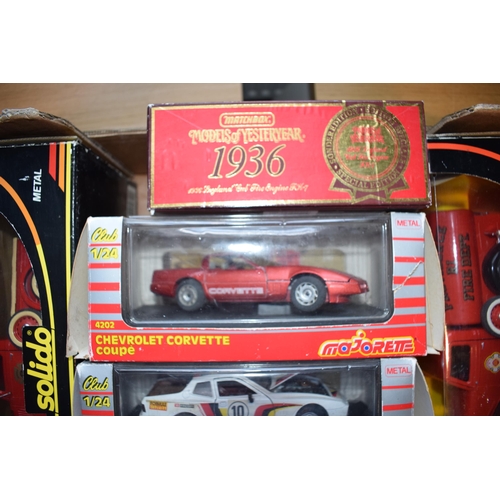 492 - A collection of boxed vintage die cast vehicles to include Solido 8003 and 8005 Fire Engines, Majore... 