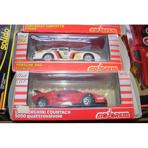 492 - A collection of boxed vintage die cast vehicles to include Solido 8003 and 8005 Fire Engines, Majore... 