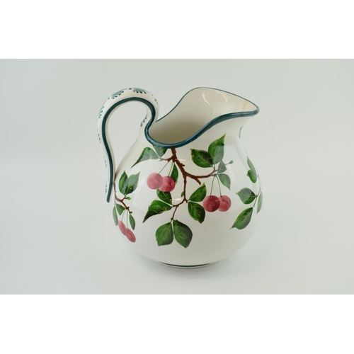 91 - Large Wemyss Ware bulbous jug, decorated with plums and foliage, impressed marks and stamped retaile... 