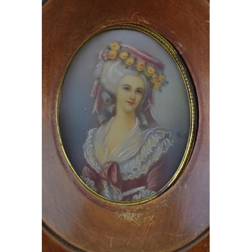 616 - A framed portrait of a lady in traditional dress, wooden frame, 16cm tall.