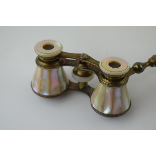 619 - A pair of Mother of Pearl opera glasses with carry bag.