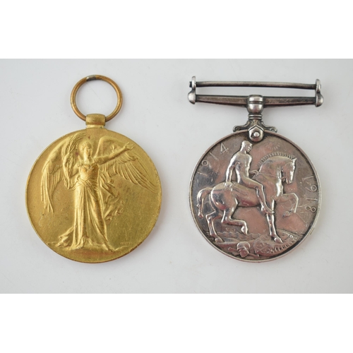 623 - A pair of World War One medals to include silver 1914-1918 medal (2), 243516 DVR J THOMPSON RA.