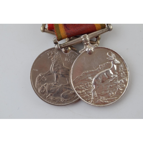 624 - A pair of World War Two medals to include an Africa service medal and 1939-1945 medal, W587148 T M A... 