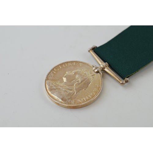 627 - Victorian silver medal 'For Long Service in the Volunteer Force', with ribbon, unnamed.