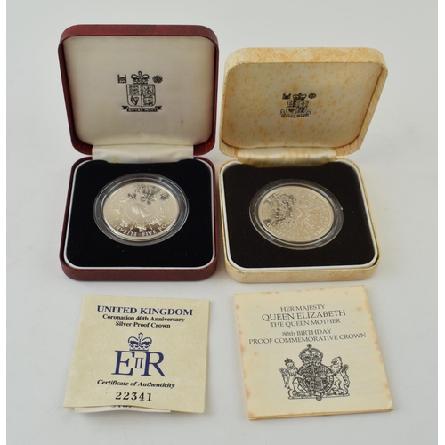 631 - Two cased silver proof crowns (2), each weighing 28g.