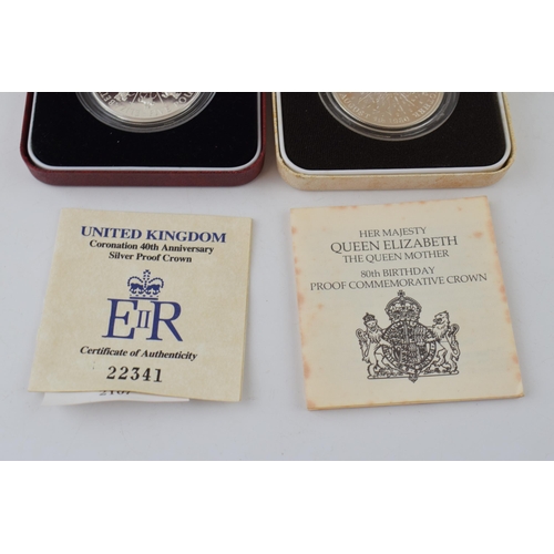 631 - Two cased silver proof crowns (2), each weighing 28g.