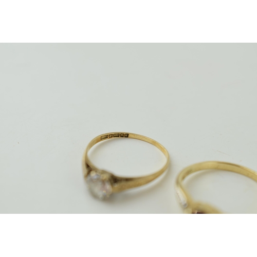 643 - A pair of 9ct gold ladies rings, set with semi precious stones, combined 3.3g, red stone ring size Q... 