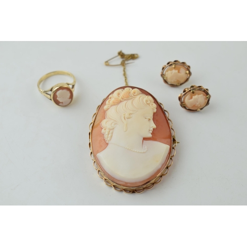 647 - A collection of 9ct gold cameo items to include a brooch a pair of earrings and a ring. Gross weight... 