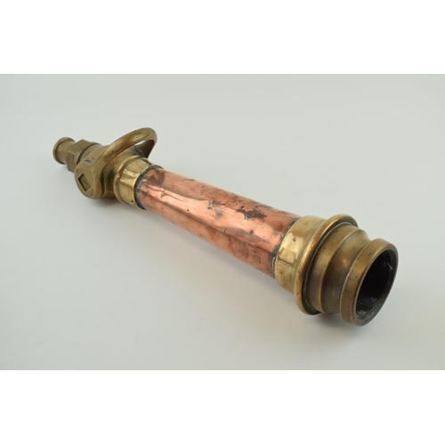 314 - Antique brass fire hose nosel, made by Charles Winn & Co Makers Birmingham. Height 40cm.