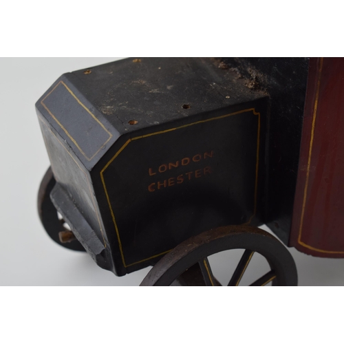 321 - Scratchbuilt vintage model of a horse drawn carriage, 'London Chester VR', 38cm long.