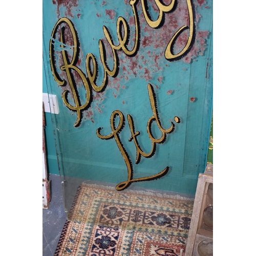 328 - Antique shop advertising cut glass window for 'Beverlys Ltd.' shop in Leek, Staffordshire. Gilt sign... 